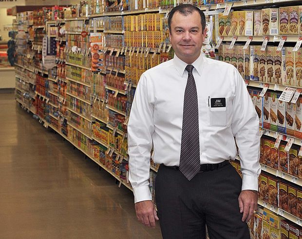 Muscatine Journal photo of Jim Simmons, director of the Hy-Vee supermarket in my town.